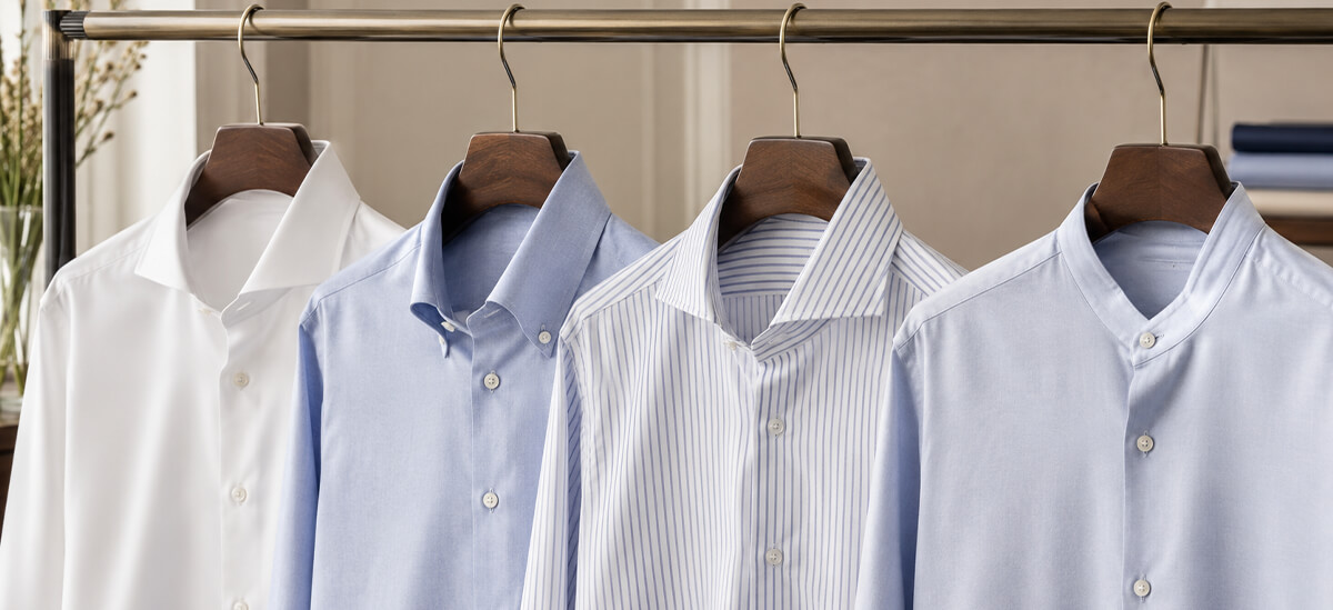 Four men's shirts showing different collar shapes